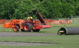 A-Turf removing old turf at Elizabethtown College for turf replacement