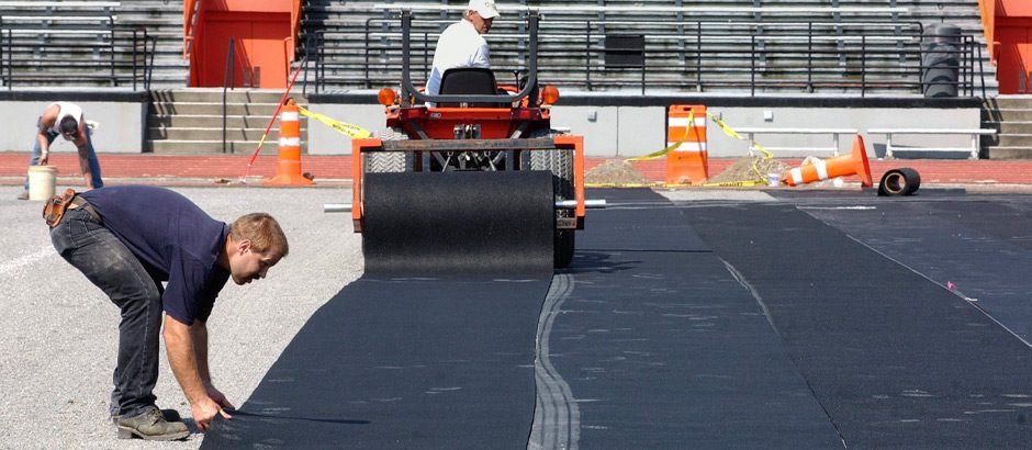 ShockPad installation over the base and under the turf