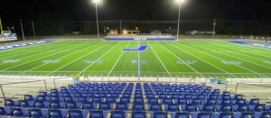 football stadium with artificial grass field turf